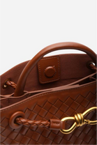 Premium Woven Top Handle Bag with Gold Knot Detail In Tan Pu