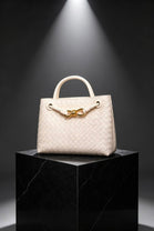 Premium Woven Top Handle Bag with Gold Knot Detail In Cream Pu