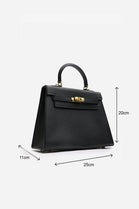 Crossbody Bag With Gold Lock in Textured Black