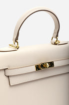 Crossbody Bag With Gold Lock in Textured Cream