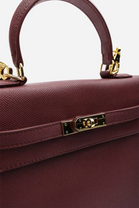Crossbody Bag With Gold Lock in Textured Maroon