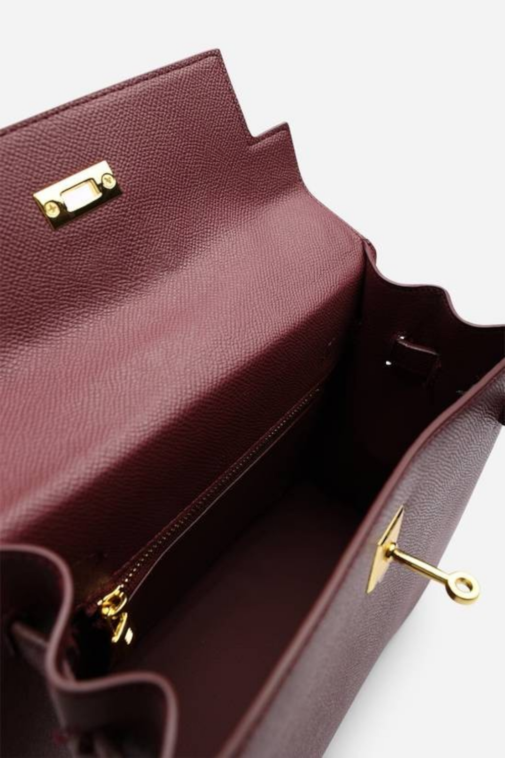Crossbody Bag With Gold Lock in Textured Maroon