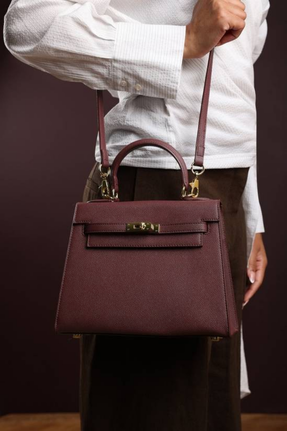 Crossbody Bag With Gold Lock in Textured Maroon