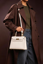 Crossbody Bag With Gold Lock in Textured Cream