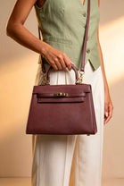Crossbody Bag With Gold Lock in Textured Maroon
