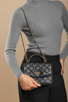 Quilted Top Handle Bag with Twist Lock in Black