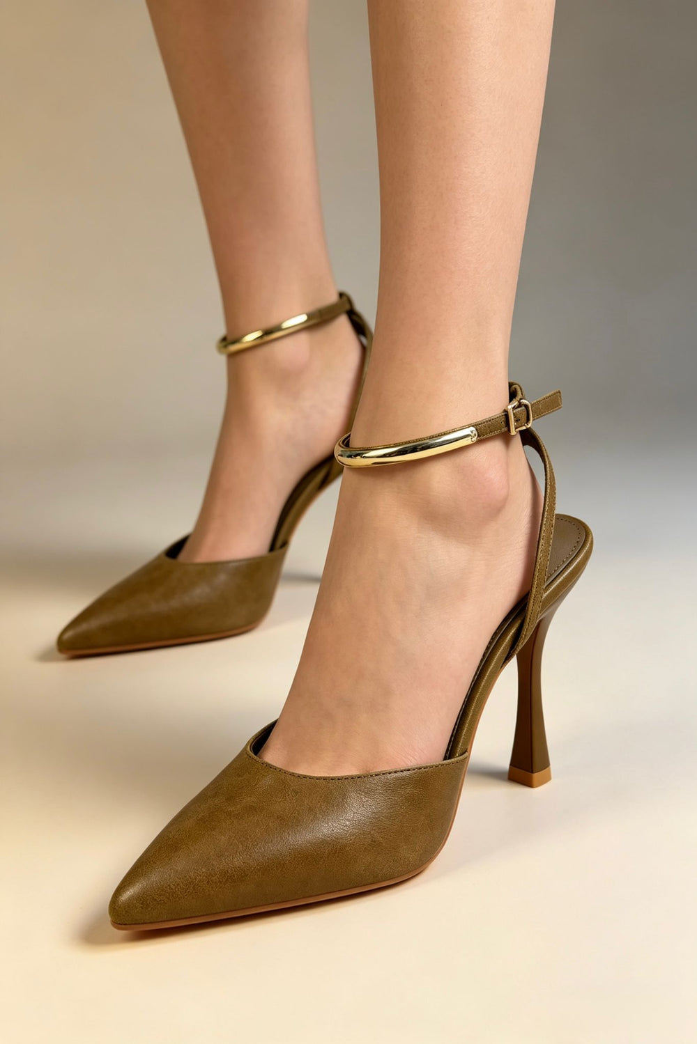 Tan Pointed Toe High Heel Pumps With Gold Ankle Strap