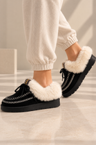 Cozy Fur Lined Moccasin Slippers in Black | Wholesale