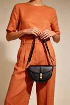 Wholesale Black Faux Leather Crossbody Bag with Adjustable Strap & Secure Lock