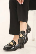 Black Patent Loafers with Gold Medallion Detail
