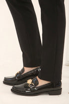 Black Patent Loafers with Gold Medallion Detail