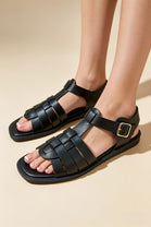 Black Faux Leather Fisherman Sandals With Gold Buckle Strap