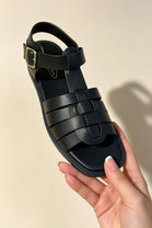 Black Faux Leather Fisherman Sandals With Gold Buckle Strap