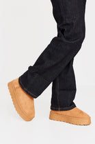 CAMEL THICK SOLED SLIP ON FUR LINED ANKLE BOOTS