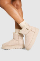 BEIGE THICK SOLED SLIP ON FUR LINED ANKLE BOOTS