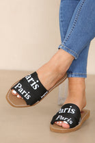 BLACK PRINTED LOGO FLAT SLIDERS SANDALS